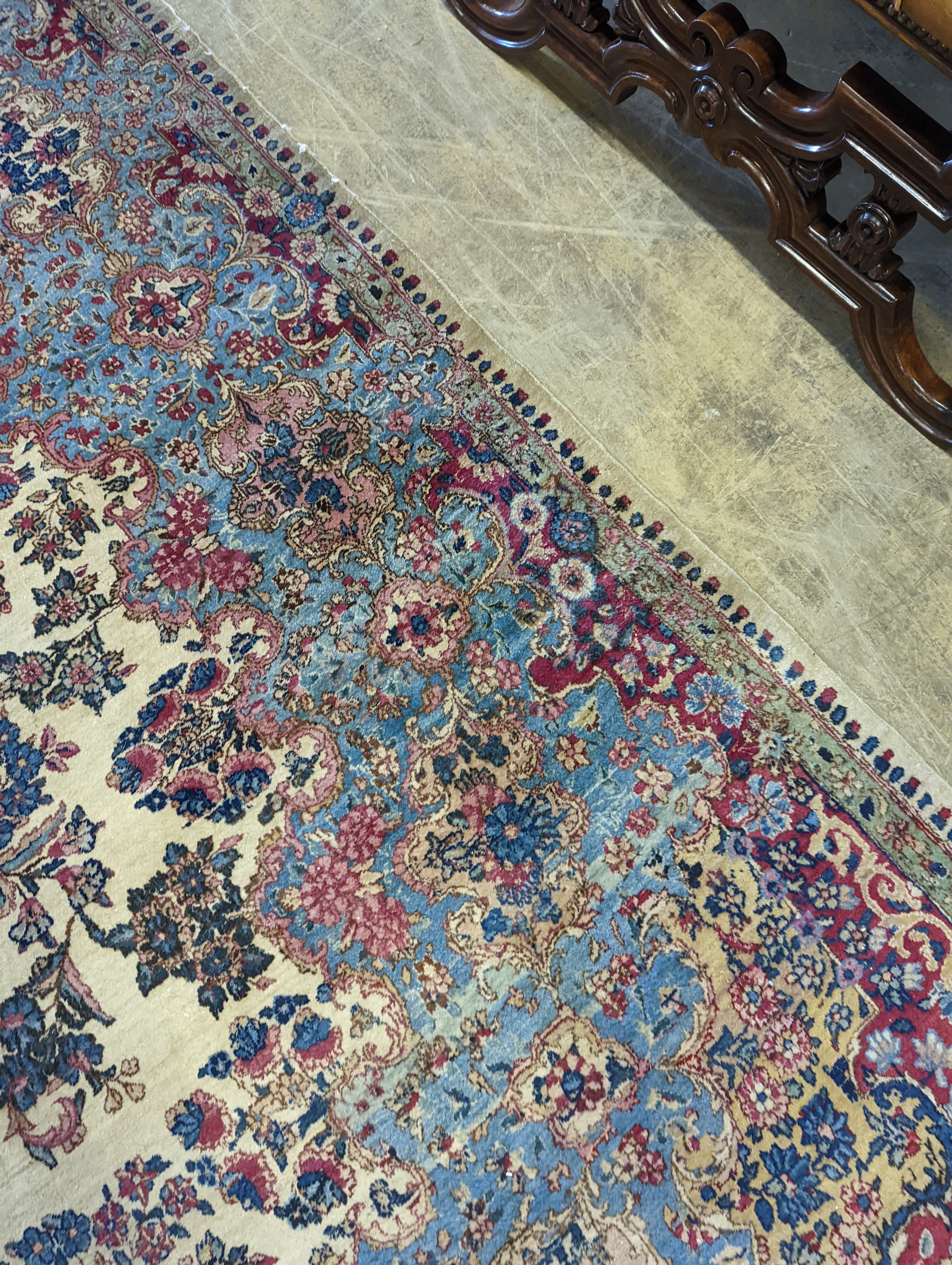 A North West Persian ivory ground carpet, 396 x 290cm